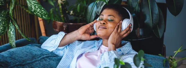 Improving Mental Health in the Workplace - Lady with headphones