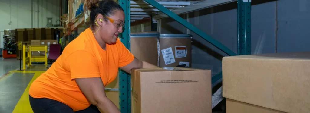 Workplace Injury Prevention - woman lifting box